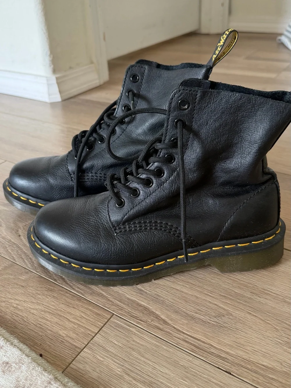 Dr. Martens Black Leather 8-Eye Lace-Up Boots with Yellow Stitching